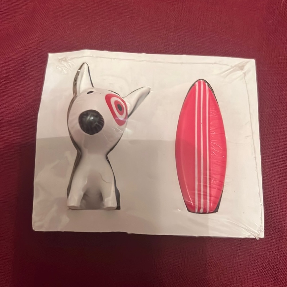 Target bullseye dog and surfboard figurines